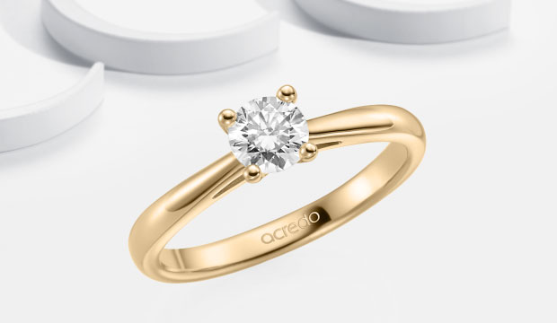 Forlovelsesringer i rosa gull med diamant | acredo